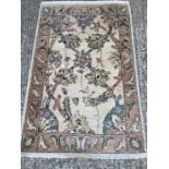 A beige ground rug with floral pattern and geometric boarder *97cm x 152cm)