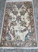 A beige ground rug with floral pattern and geometric boarder *97cm x 152cm)