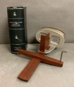 A Sun Sculpture Stereoscope Viewer along with Underwood and Underwood South African War cards