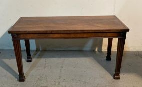 A flame mahogany side table on column legs (H46cm W92cm D46cm)