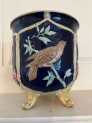 A majolica footed planter , decorative with birds