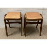 A pair of Mid Century stacking stools