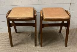 A pair of Mid Century stacking stools