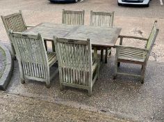 A patio furniture ltd, six seater outdoor table with six Henley stacking chairs