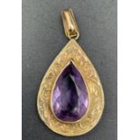 A 9ct gold pendant with amethyst style pear drop stone (Approximate Total Weight 2.8g