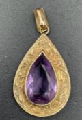 A 9ct gold pendant with amethyst style pear drop stone (Approximate Total Weight 2.8g