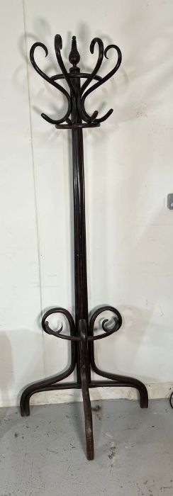 A four hook coat stand, that stand flat to wall (H198cm)