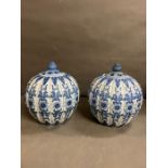 A pair of blue and white pumpkin style vases