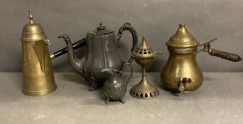 A selection of brass and pewter to include coffee pots, milk jug and an incense burner
