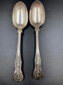 Two silver spoons, hallmarked for London 1895 by maker Holland, Aldwinckle & Slater (Approximate