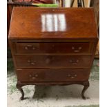 A mahogany bureau with fall front opening to drawers on cabriole legs (H100cm W76cm D46cm)