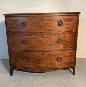 A three drawer flame mahogany chest of drawers with brass ring drop handles (H86cm W94cm D54cm) AF