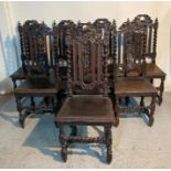 A selection of eight oak Victorian dining chairs with leaf carved central splats and barley twist