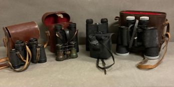 A selection of vintage binoculars field glasses and a pair of Opera glasses to include Yashica and