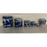 Five blue and white oriental porcelain covered jars and one blue and white pot