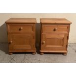 A pair of pine bedside tables