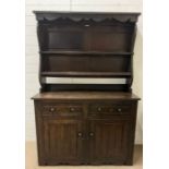 An oak welsh dresser (H184cm W122cm D44cm)