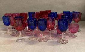 A large selection cranberry and blue Petite glassware