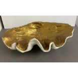 A giant faux clam shell inside gilded painted (H24cm W65cm D38cm)