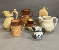 A selection of stoneware jugs and mug, one stamped Bailey and Co Fulham along with a Staffordshire