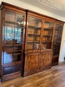 A George IV style library breakfront bookcase, four pieces (H238cm W300cm D50cm)