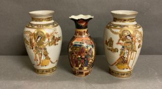 A selection of three Chinese vases, one pair and one other