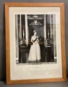 A photo of Queen Elizabeth II signed Elizabeth R by photographer Anthony Buckley.