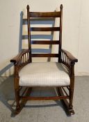 An Arts and Craft rocking chair attributed to William Birch for Liberty