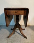 A drop leaf sofa table on sweeping legs with lion paw feet and drawer to side (H79cm W92cm D44cm)