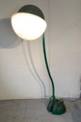 A Mid Century floor lamp "Locus Solus" by Gae Aulenti, green painted tubular steel with cast iron