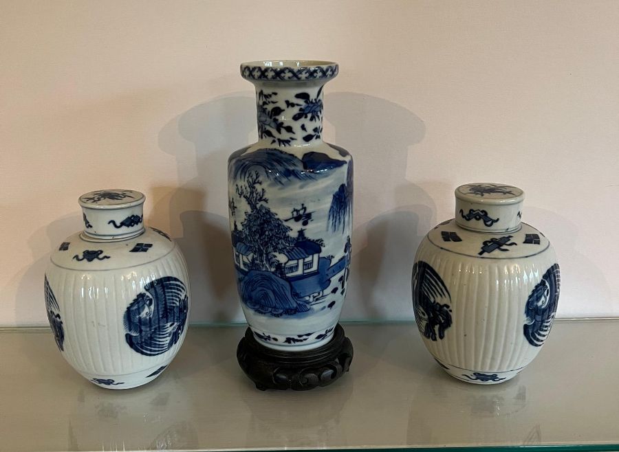 Three blue and white porcelain vases and lidded ginger jars