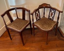 Two corner chairs with string inlay.
