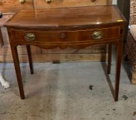 An antique mahogany side table with shield inlay, motif and string inlay (H75cm W92cm D53cm)