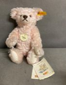 Classic 1920 Steiff Teddy with all tags and labels in pink with squeak.