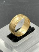 A 9ct yellow gold wedding band (Approximate Total Weight 4g)