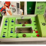 A selection of vintage Subbuteo toys and a Casdon soccer board and players