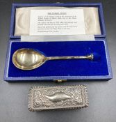 A boxed silver Pudsey spoon and a hallmarked silver topped glass pot.