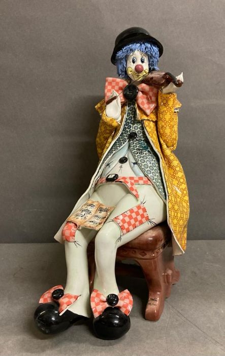 A large limited edition Zampiva seated clown playing a violin.AF