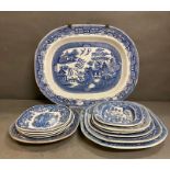 A selection of blue and white meat and serving platters to include Wedgewood and Willow