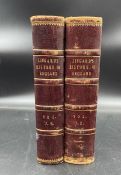 Two leather bound volumes of Lingards History of England Vol 7-8 and 1-2.