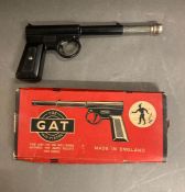 A vintage boxed "The GAT air pistol