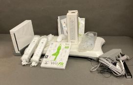 A Nintendo Wii with Wii fit board