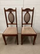 A pair of Arts and Craft style chairs