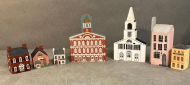 A small selection of wooden miniature houses