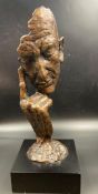 A bronze semi-abstract study of a thinking man on a square base signed Berni, 1996 by Kim Berni,