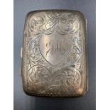 A silver cigarette case, hallmarked for Birmingham.