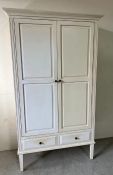 A double white wardrobe with drawers under (H192cm W110cm D55cm)