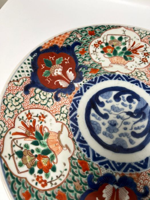 A Japanese Imari charger with roundels of flora and fauna (Dia33cm) - Image 7 of 7