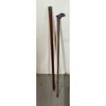 Two silver capped walking sticks