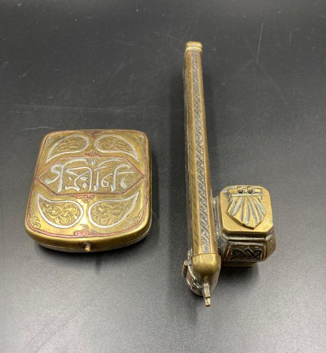 A Middle Eastern pen holder along with a Middle Eastern cigarette case